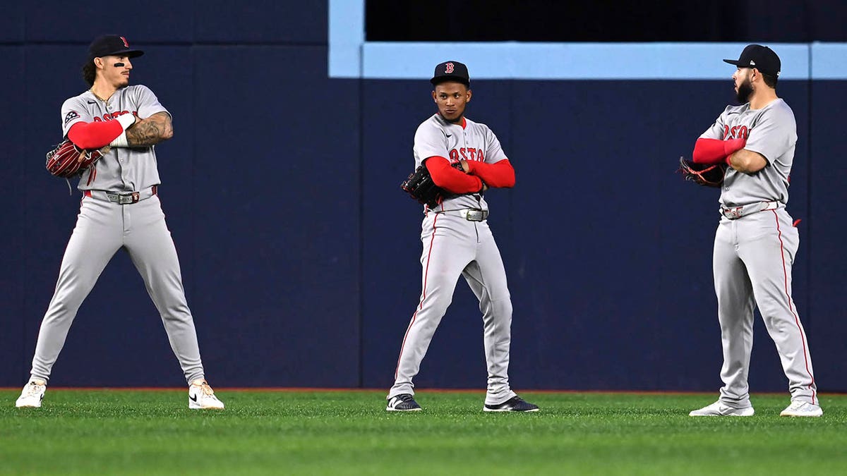 Jarren Duran, Ceddanne Rafaela, and Wilyer Abreu pose