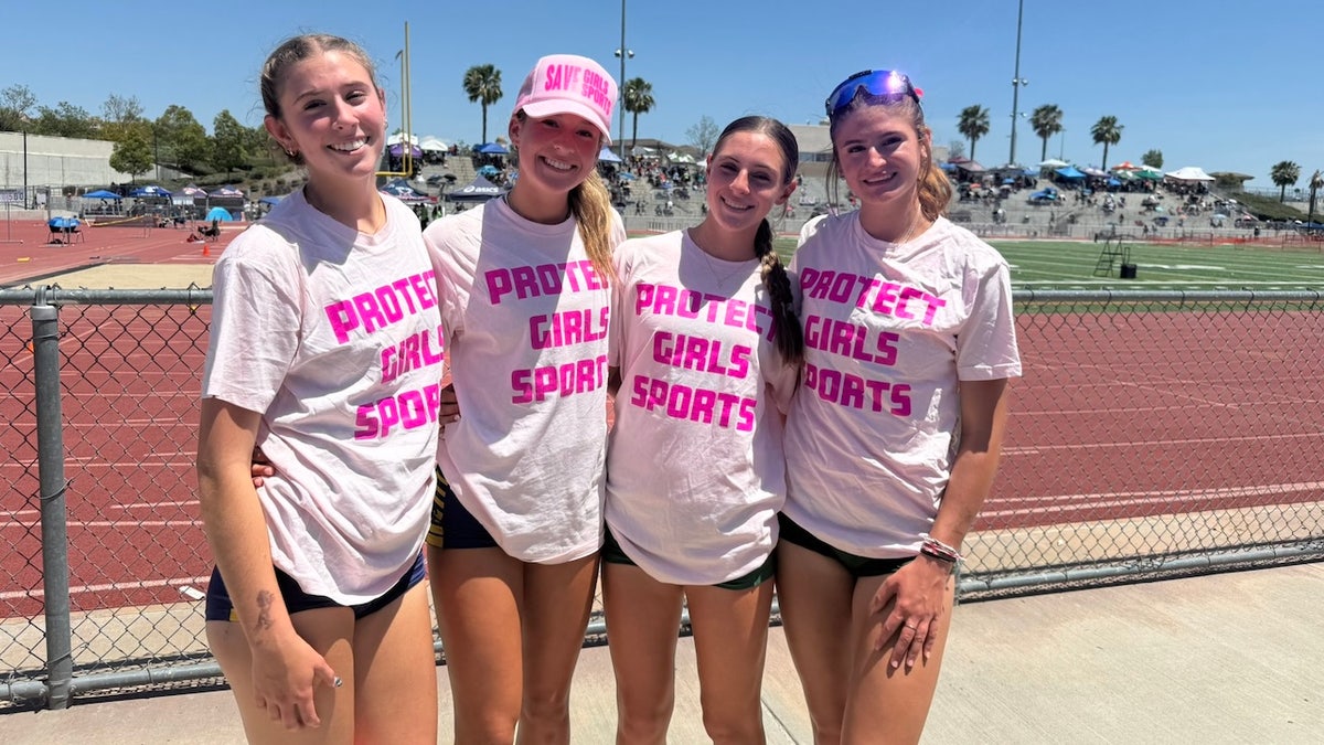 California high school girls' athletes wear 'Protect Girls Sports' shirts at a postseason track meet at Yorba Linda High School on Saturday, May 10, 2025.