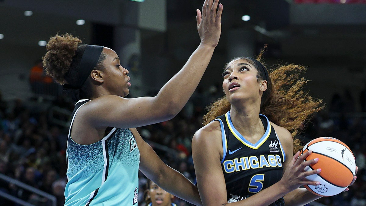 Angel Reese in paint