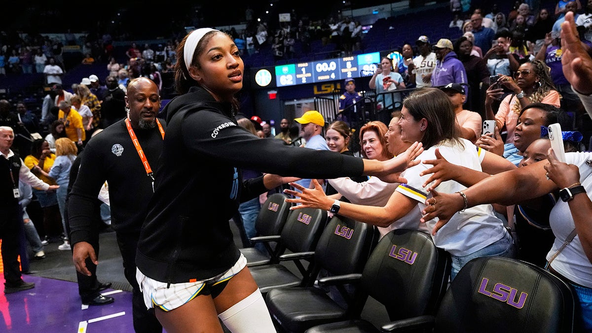 Angel Reese slaps hands