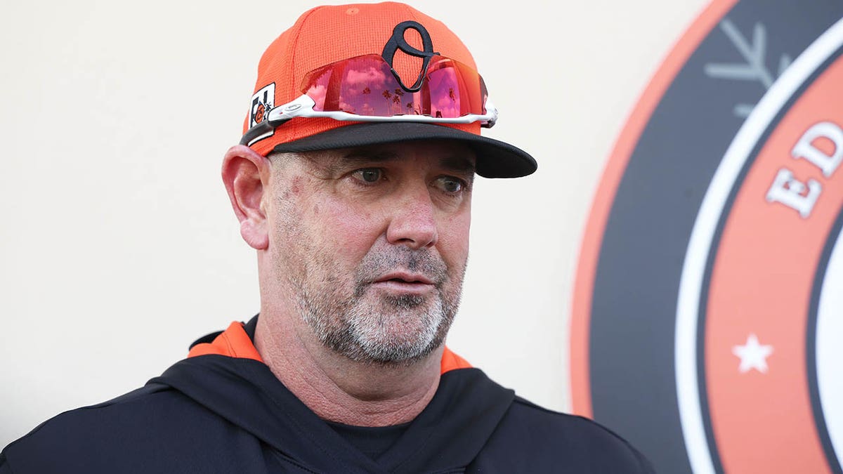 Brandon Hyde talks to reporters