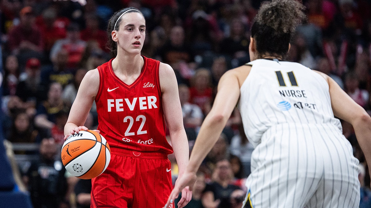 Angel Reese drives to the basket