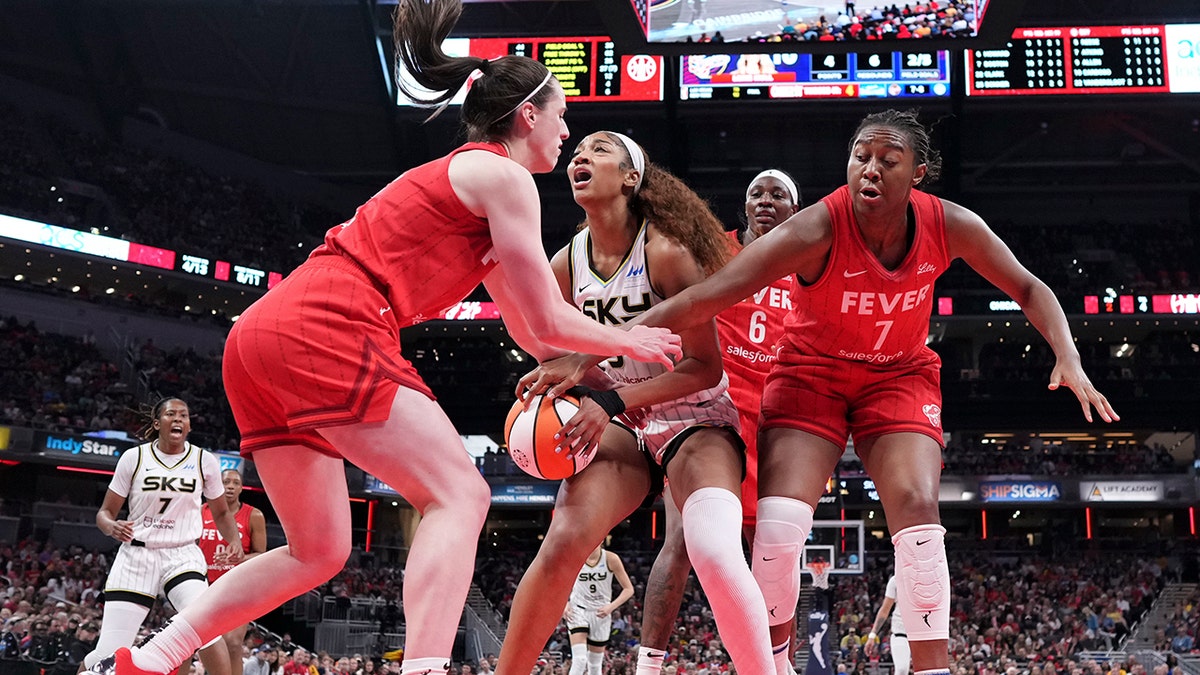 Caitlin Clark fouls Angel Reese