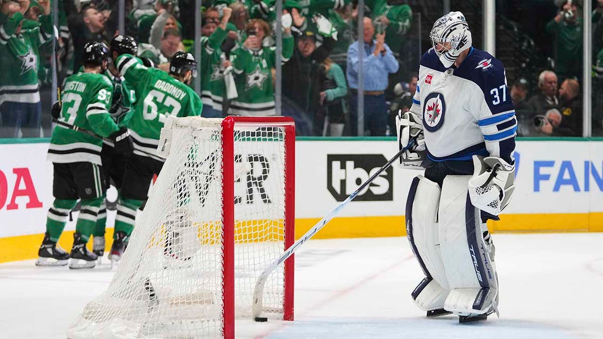Connor Hellebuyck head down
