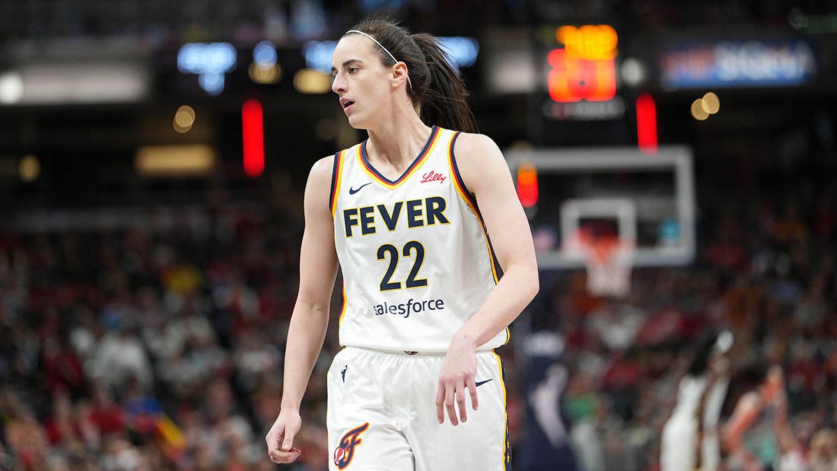 Caitlin Clark looks on