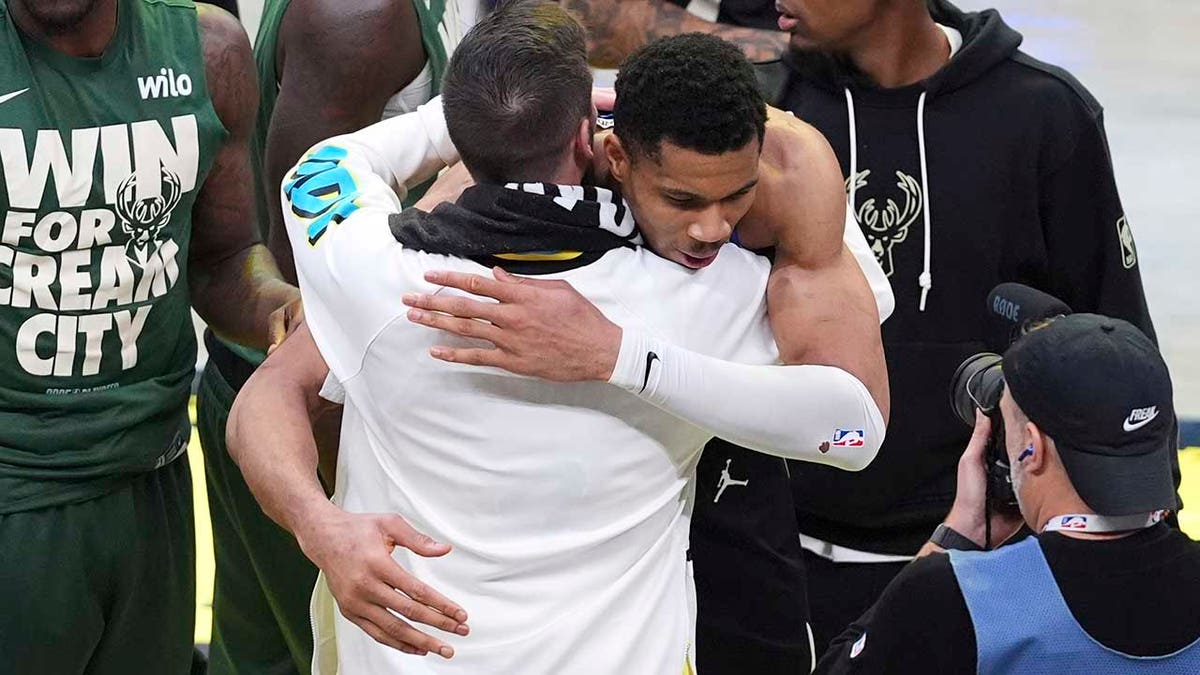 Giannis Antetokounmpo and TJ McConnell