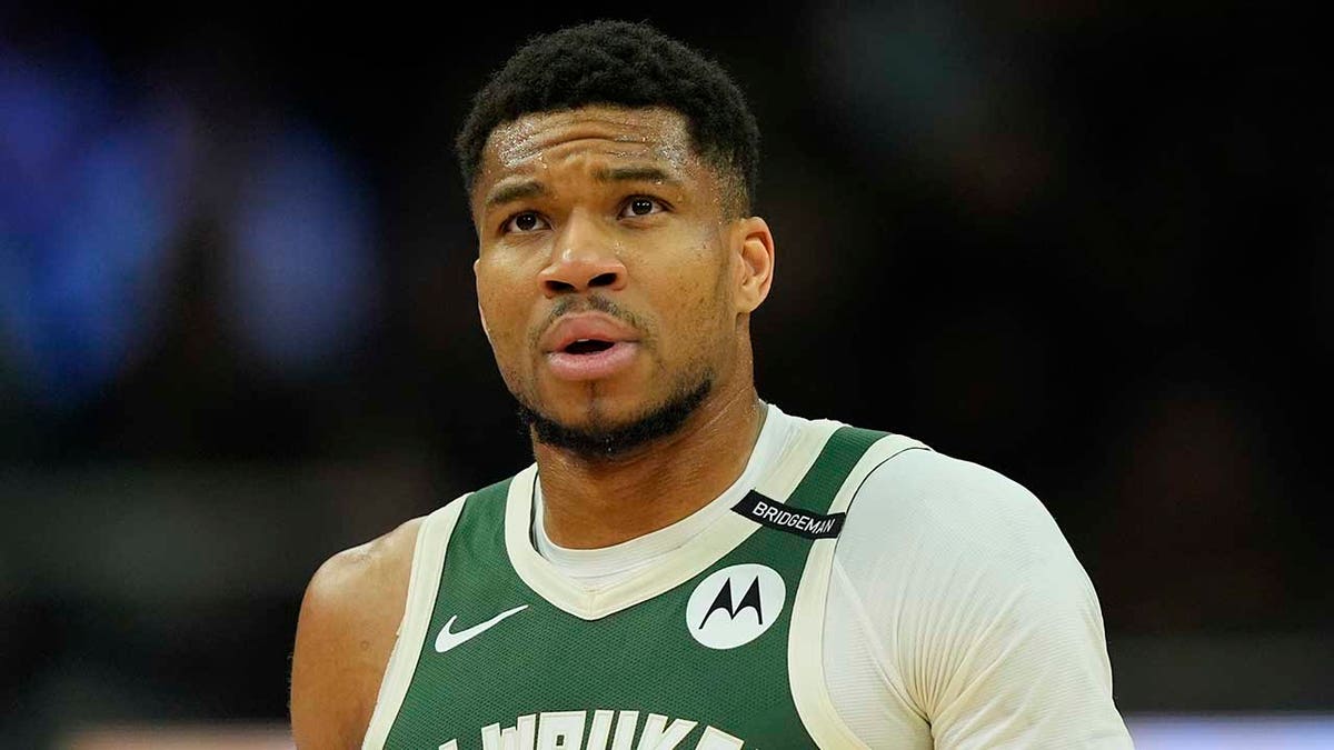 Giannis Antetokounmpo walks