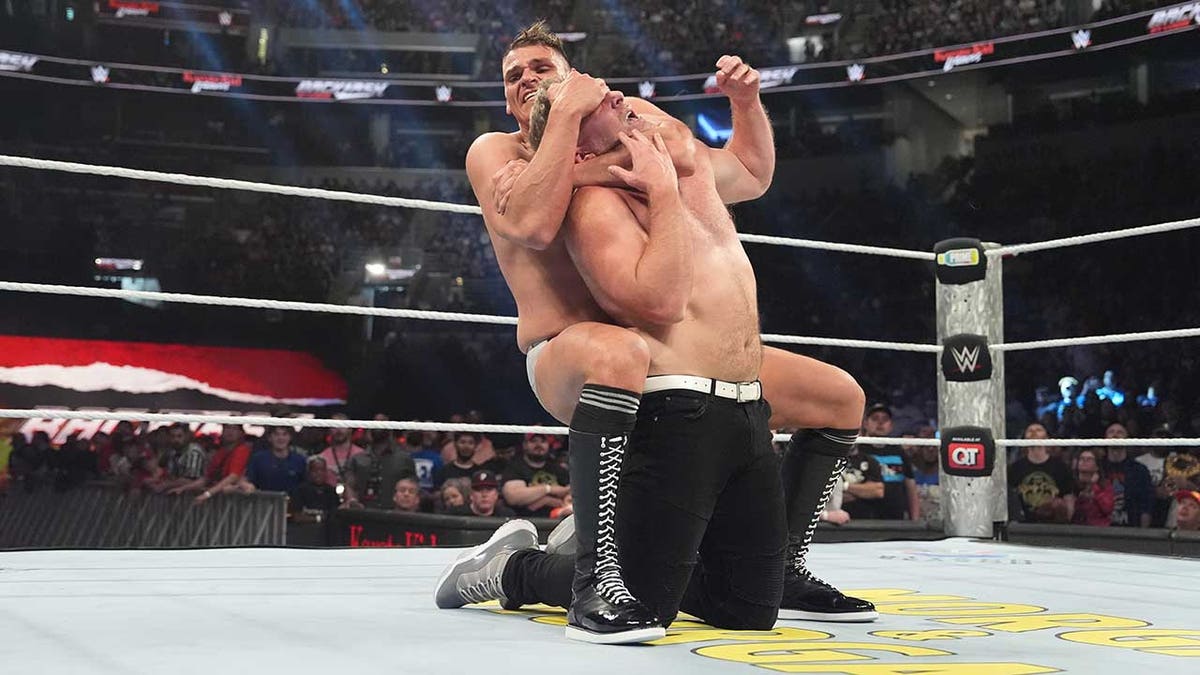 Gunther chokes Pat McAfee