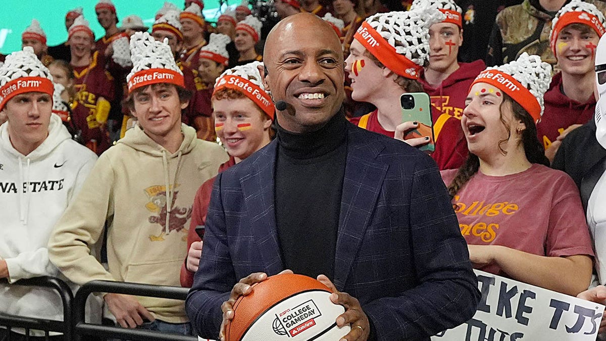 Jay Williams looks on