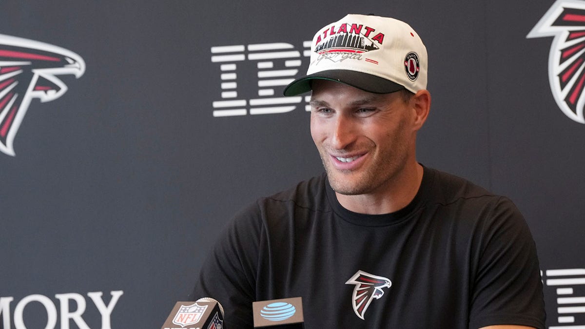 Kirk Cousins talks to reporters