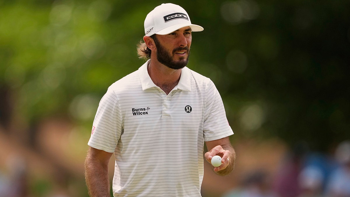 Max Homa walks the course