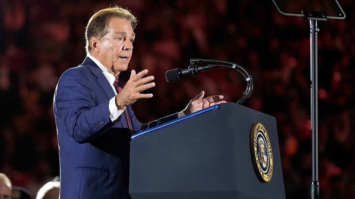 Nick Saban speaks before President Donald Trump