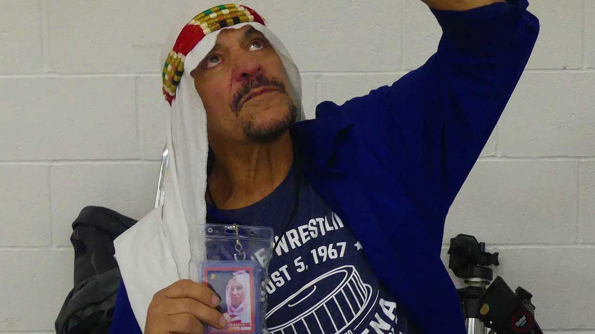 Sabu poses for a photo