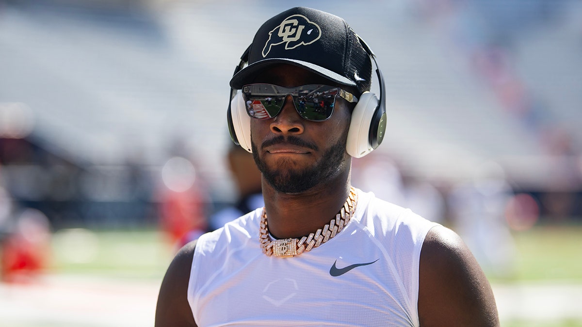 Shedeur Sanders looks on