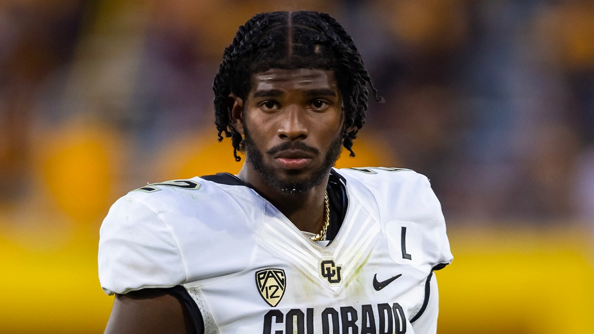 Shedeur Sanders looks on