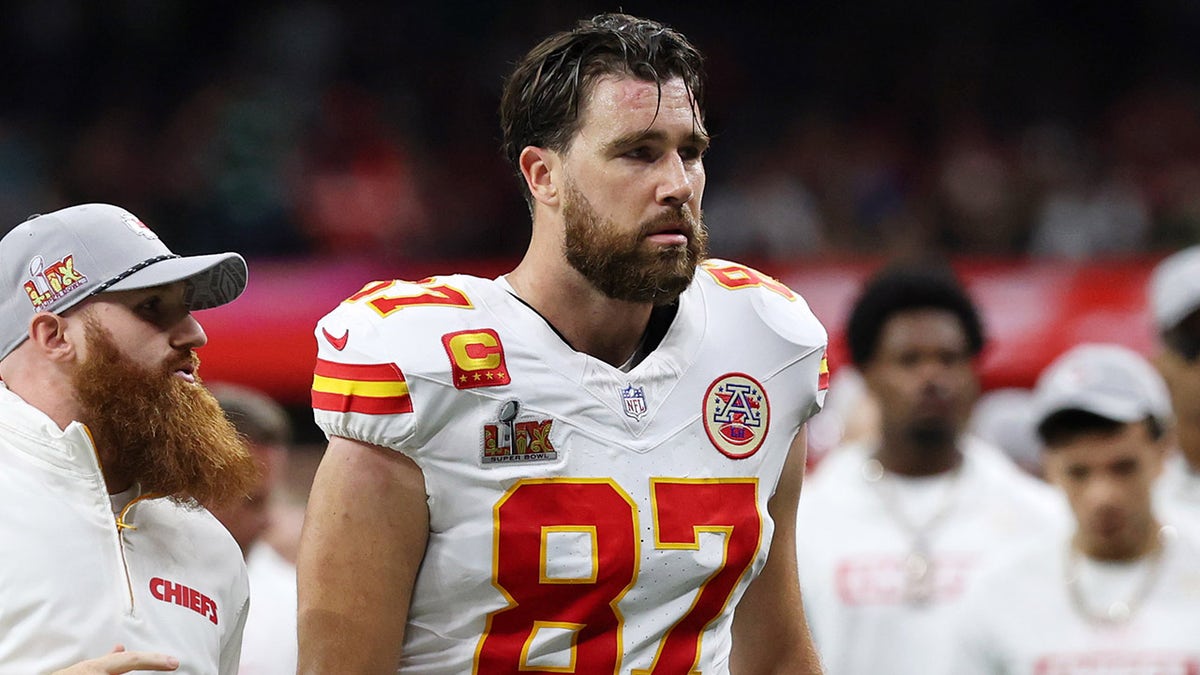 Travis Kelce walks off the field