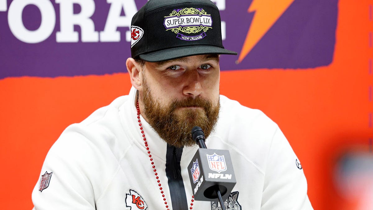 Travis Kelce talks to reporters