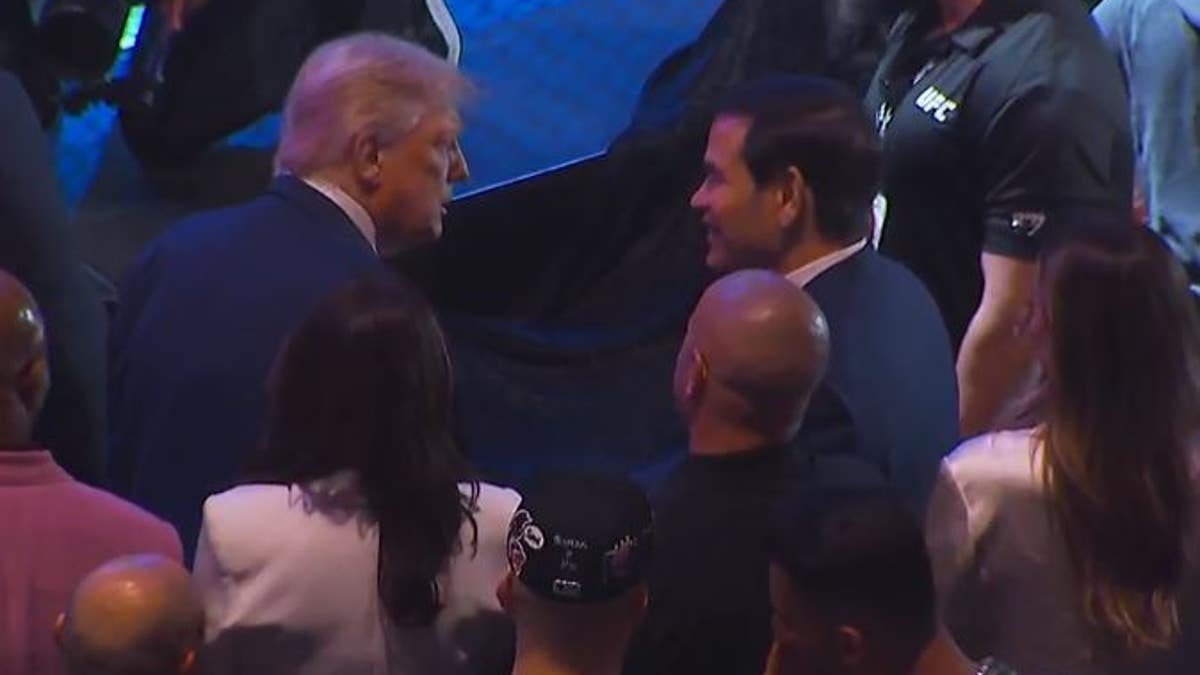 Donald Trump talks to Marco Rubio