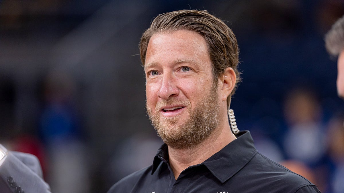 Dave Portnoy looks on