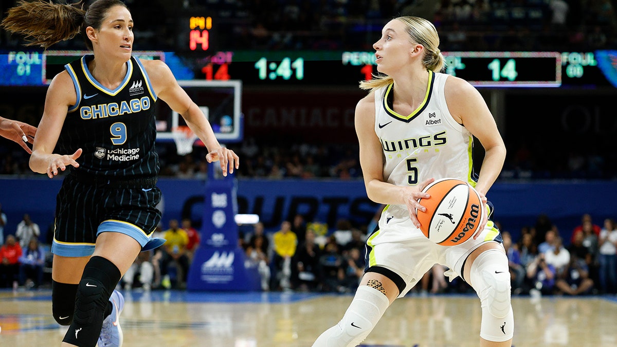 Dallas Wings guard Paige Bueckers, #5, looks to shoot against Chicago Sky guard Rebecca Allen, #9, during the first half at Wintrust Arena on July 9, 2025.