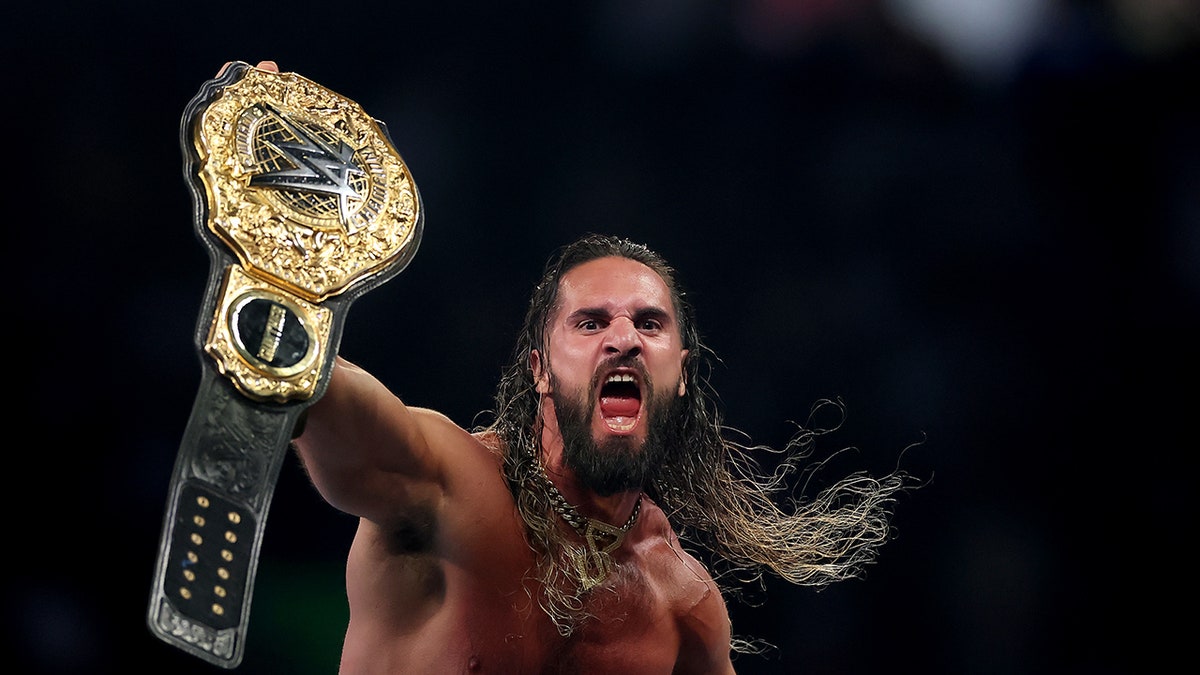 Seth Rollins celebrates