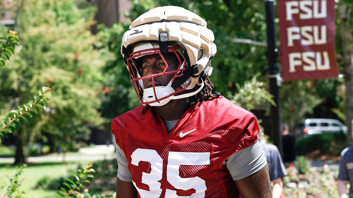 Ethan Pritchard with the guardian cap