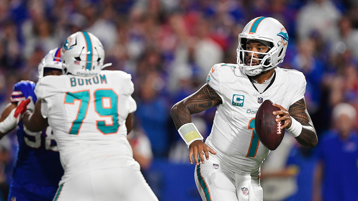 Tua Tagovailoa looks down field