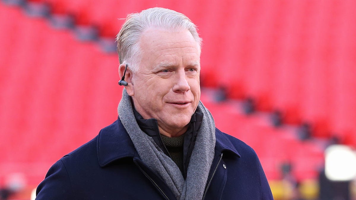Boomer Esiason looks on before an NFL game