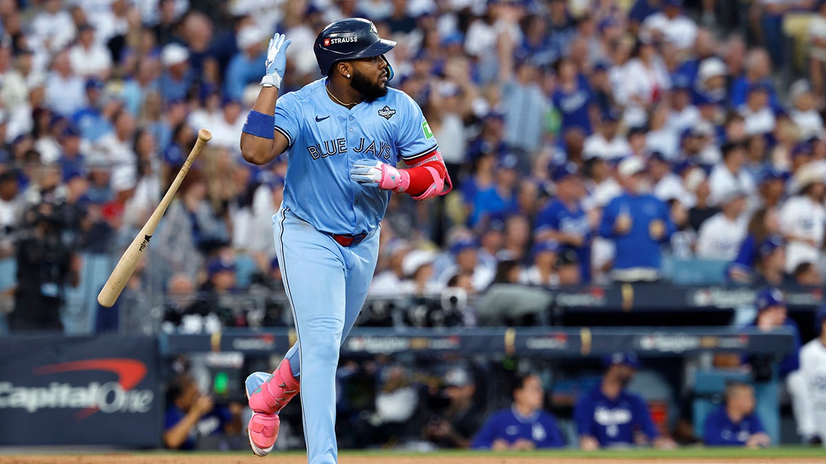 Vladimir Guerrero Jr flips bat